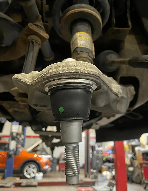 New OEM lower ball joint ready for direct replacement